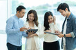 © PaeGAG - Group of businesspeople having meeting in conference room.