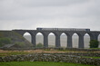 Train crossing Ribbleshead Viaduct in Yorkshire Dales