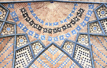 Detail of traditional persian mosaic in arch of Jameh Mosque, Qazvin, Iran