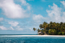 Maldives, Kolhumadulu Atoll, Clouds Over Beach Of Tropical Island