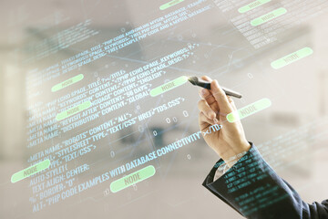 Aufkleber - Man hand with pen working with abstract virtual coding illustration on blurred office background, software development concept. Multiexposure