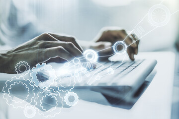 Aufkleber - Double exposure of robotics technology hologram and hands typing on laptop on background. Research and development software concept