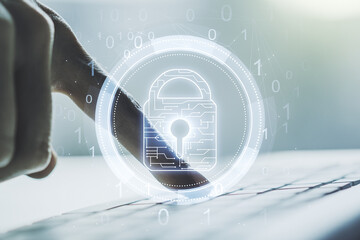 Aufkleber - Double exposure of creative lock hologram with chip and hands typing on laptop on background. Information security concept