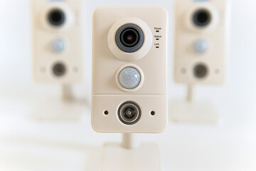 Poster - Front view of new security surveillance camera on white background. Clipping path