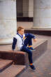 © Daria - portrait of a schoolboy teenager 12 years old in stylish school clothes. back to school