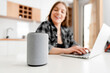 © Proxima Studio - Woman using smart speaker