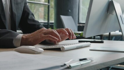Closeup male hands unrecognizable worker programmer Caucasian man in formal suit hacker programmer manager businessman working online browsing chatting in network typing on keyboard computer in office