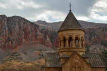 Beautiful Dome Of St. Astvatsatsin Church Is Decorated With Arched Columns At Noravank Monastery Complex Contrast Beautifully With The Sharp Red Rock Cliffs, Armenia