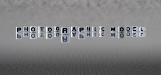 photographic model word or concept represented by black and white letter cubes on a grey horizon background stretching to infinity