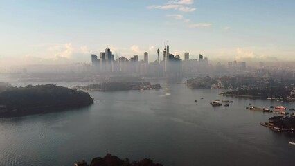 Canvas Print - Headlands on Sydney harbour with residential suburbs – aerial flying as 4k.
