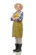 © Syda Productions - gardening, farming and old people concept - portrait of smiling senior woman in green garden apron, straw hat and rubber boots over white background