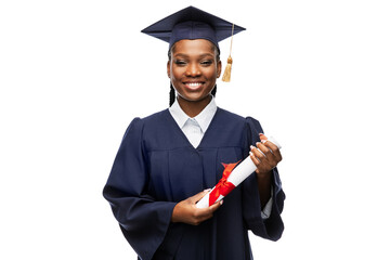 education, graduation and people concept - happy graduate student woman in mortarboard and bachelor gown with diploma