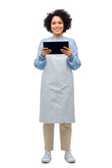 Sticker - cooking, culinary and people concept - happy smiling woman in apron with tablet pc computer over white background