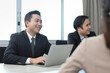 © feeling lucky - Collaborative process of professional businesspeople going over on new project together, using computer presentation and brainstorming ideas, coworker and working together at office meeting concept