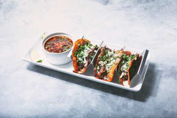 Wall Mural - A view of a plate of birria tacos.