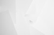 © finepoints - White abstract geometric background with soft light paper surfaces fly as random volumetric pattern with glow and perspective. Simple elegant modern backdrop in minimal style.