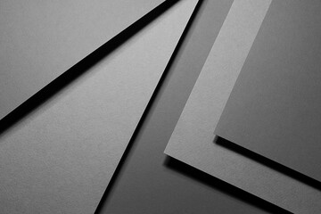 Poster - graphite grey abstract textured geometric stepped background with fly rectangle paper sheets and str
