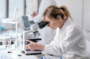 Wall Mural - woman working in a medical laboratory