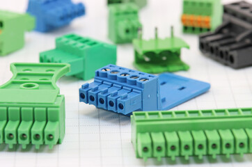 Electrical terminals for connecting the mounting wires in the control panel close-up.