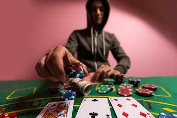 Wall Mural - Man playing BlackJack at the casino