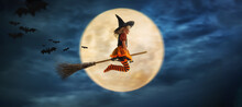 Child Flies As A Witch To Helloween With The Moon In The Background
