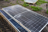Fototapeta  - Defekte Solarpanele auf einer Baustelle für Grünen Strom