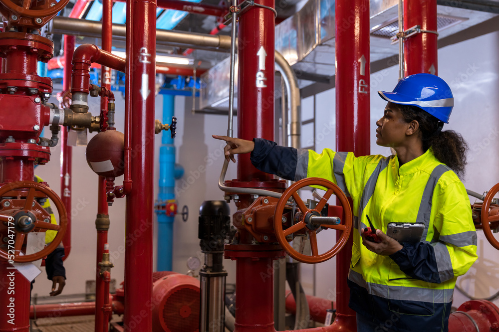 Foto Engineer or technician work checking Fire suppression system and ...