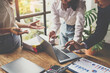 © crizzystudio - business people meeting in the office Calculate the tax and income of the company's investment. Strategic Planning and Brainstorming colleague concept, report, analyze graph plans