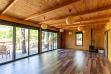 Sports Activities Room Made Of Wood In A Country House With Windows To Nature