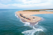Aerial View Of Trucks On The Beach And People Fishing At Cape Point In Hatteras North Carolina