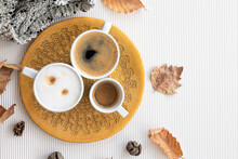 Best Autumn Composition With Cups Of Coffee And Leaves On A Textural White Background, Flat Lay, Free Space
