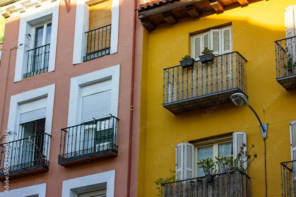Yellow pink facades of residential apartment buildings houses in ...