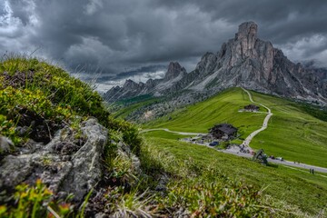 Dramatic shot of the Giau Pass and its road in the Dolomites in the province of Belluno in Italy