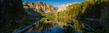 Reflection Of Mountains And Trees On Parker Lake In California Eastern Sierra Mountains 