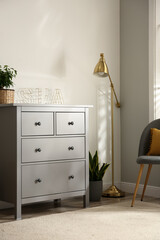 Sticker - Grey chest of drawers in stylish room interior