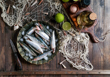 Fresh Sardines, Rusric Wooden Background, Lemon And Salt, Top View