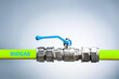 Biogas pipe, biogas plant. green tube and valve for biogas on grey background with copy space.