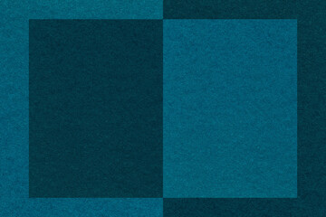 Texture of navy blue and turquoise paper background pattern. Structure of craft dark cerulean cardboard with frame.