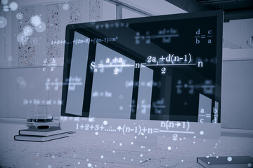 Wall Mural - Close up of workplace with computer, supplies and glowing mathematical formulas on blue background. Education, knowledge and statistics concept.