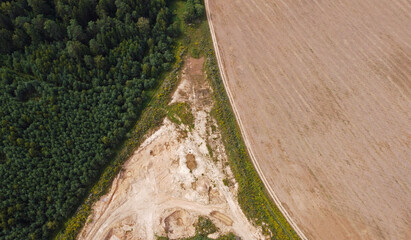 Wall Mural - Aerial view of agro rural fields. Harvesting on the farm landscape