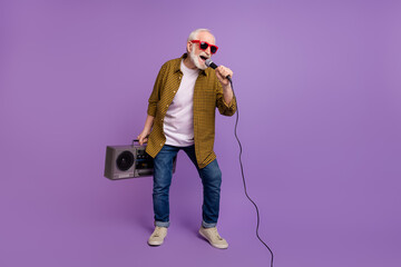 Canvas Print - Full body photo of energetic grandpa white hair club dj singer dressed stylish yellow plaid shirt isolated on lilac purple color background