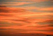 Red, Orange And Blue Sunset Sky With Clouds In Namibia, Africa