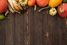 Autumn Vintage Background With Harvest Of Pumpkins And Decorative Gourds