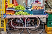 Roadside Fruit Seller In The Indian Local Market.