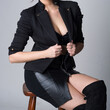 © Adam Radosavljevic - Provocative pose of young woman in black clothing combination