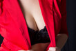 © Adam Radosavljevic - Provocative pose of young woman dresed in red and black clothing