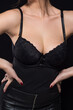 © Adam Radosavljevic - Seductive and provocative pose of young woman dresed in black lingerie clothing
