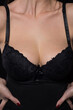 © Adam Radosavljevic - Seductive and provocative pose of young woman dresed in black lingerie clothing