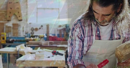 Poster - Animation of data processing over caucasian male carpenter working in workshop