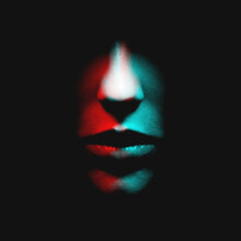 Abstract Fashion Concept. Woman Face In Black Shadow Background With Copy Space In Red And Blue Color Split Effect Style. Nose Is In Camera Focus. Selective Focus And Image With Shallow Depth Of Field